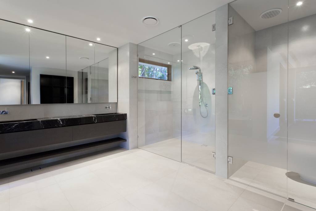 A beautiful glass shower in a luxury home