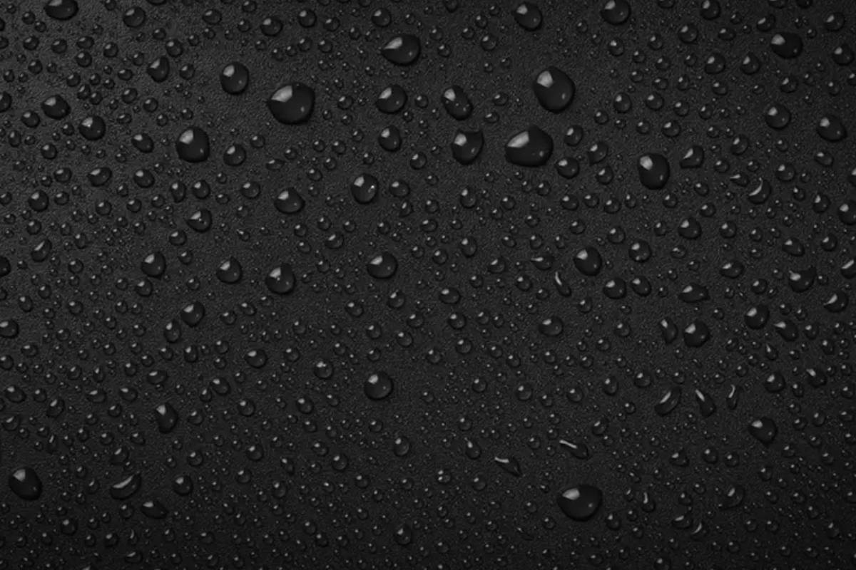 Water droplets on a black background.