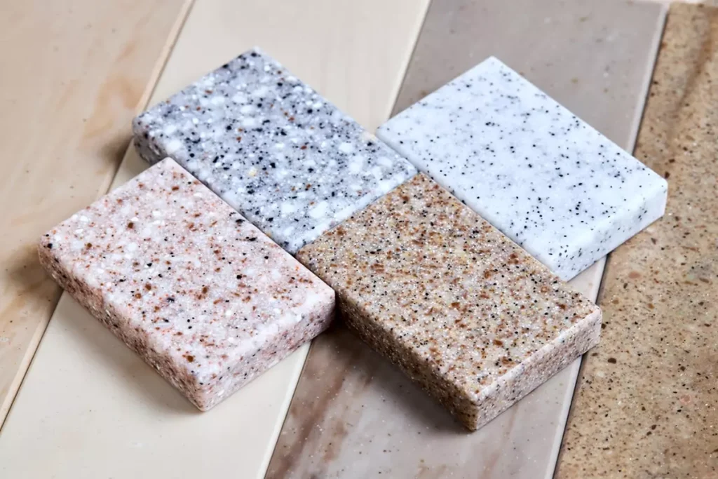 porcelain-stoneware-artificial-stone-square-samples A selection of four types of marble for countertops.
